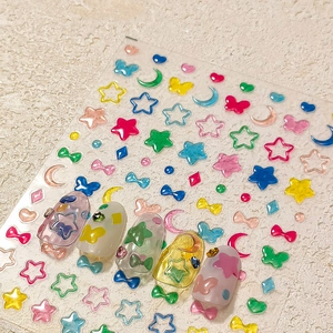 3D colorful geometric nail art stickers with stars and hearts on textured background