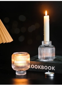 Detail of ribbed glass candle holder showing texture and dual-use design for table decor