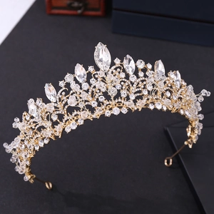 Exquisite handmade gold bridal crown with crystal beads and sparkling rhinestones for weddings