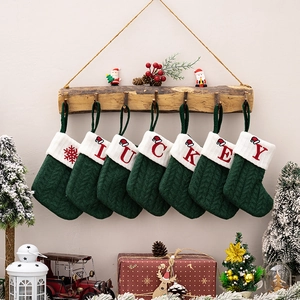 Set of 6 green knitted Christmas stockings with embroidered LUCKEY letters for holidays