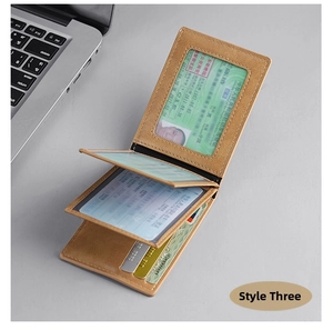 Detail of slim brown bifold wallet showing transparent ID windows and card slots