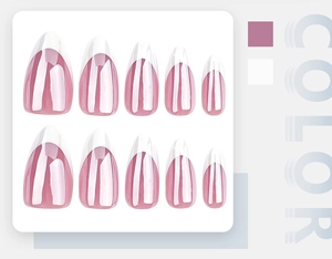 Detail showing high-gloss almond almond shape French manicure nails with pink and white tips