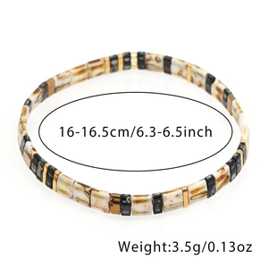 Pulsera elástica de cuentas Tila con patrón de leopardo bohemio y cuentas doradas