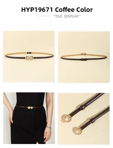 Detail of coffee brown skinny belt featuring a golden round buckle with pearl inlay