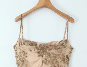 Detail of the back zipper and adjustable straps on the vintage brown floral satin top
