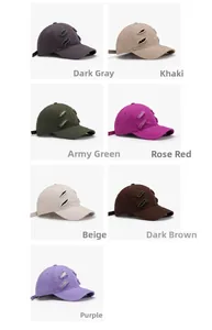 Detail view of distressed baseball caps in seven colors with frayed hole accents