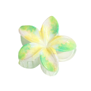 Floral lily hair claw clip with yellow and green gradient marble pattern for women