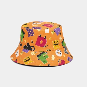 Macro detail of Halloween bucket hat with pumpkin and ghost prints on orange canvas