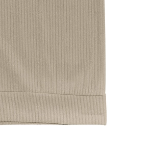 Macro shot of khaki ribbed knit texture on the hem of a men's stylish western sweatshirt