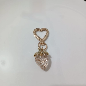 Sweet strawberry heart-shaped keychain with gold heart clasp and sparkly gold sequins