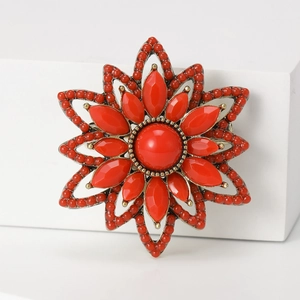 Vintage Turkish flower brooch with red beads and gems on a retro metal base