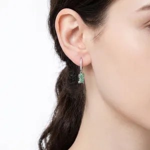 S925 silver dinosaur hoop earrings featuring green crystals and sparkling white stones