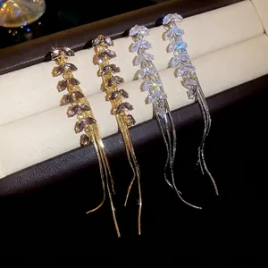Elegant tassel earrings with sparkling zircon leaves and long chains in gold and silver