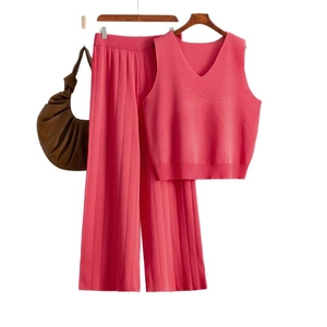 Women's summer two-piece knit set featuring coral pink V-neck vest and wide-leg pants