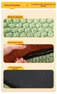 Detail display of green plush fabric, smooth zipper, and non-slip bottom on dog bed