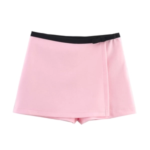 Gonna-pantalone rosa con bordo vita nero a contrasto e decorazione a fiocco raffinata