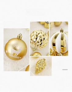 Détails de boules de Noël blanches et dorées avec paillettes et motifs de cerf