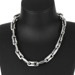 Polished silver coffee bean link chain necklace for men on black mannequin bust