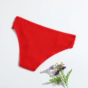 Detailed view of red ribbed cotton panties for women featuring delicate side lace trim
