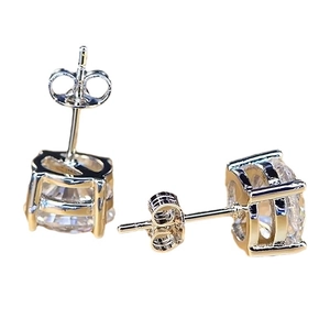 Classic four-prong round zircon stud earrings in silver finish with butterfly backs