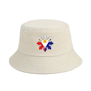 Classic beige cotton bucket hat featuring a sun and Philippine flag print on the front
