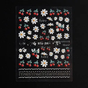 Detailed 5D embossed nail stickers featuring red cherries, white daisies, and textures