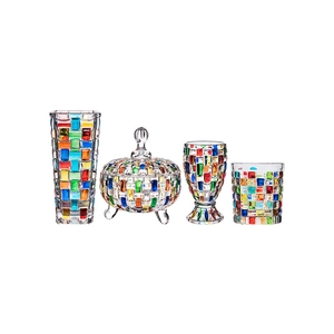 Colorful mosaic glass set featuring a tall square vase, candy jar, and elegant glassware