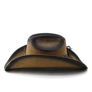 Detail of woven straw cowboy hat with ombré brim and leather band with fringe