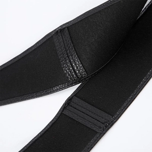 Close-up of black wide waist belt with leather reinforced stitching for coats