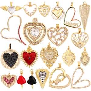 Collection of gold-plated copper heart pendants with colorful cubic zirconia and enamel