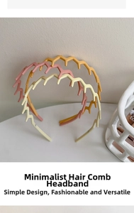 Detail of three matte pastel non-slip wavy headbands with teeth in various soft colors
