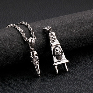 Gothic skull power plug and bullet pendant set in polished stainless steel for men