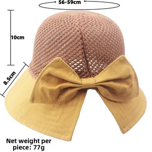 Detail showing hollow weave texture, bow decoration, and specific size dimensions of sun hat