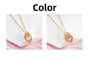 Detailed comparison of heart and crown pendant necklaces in white and pink zircon crystals