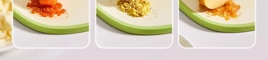 Detailed view of kitchen grinding board showing carrot, ginger and apple mashing effect
