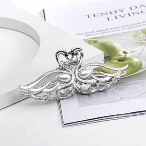 Elegant swan-shaped silver metal hair claw clip with faux pearls and cat-eye stone