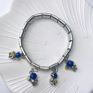 Italian style stainless steel bracelet with blue astronaut charms on shell plate