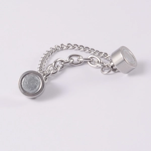 Detailed view of silver stainless steel magnetic double chain nose ring decoration
