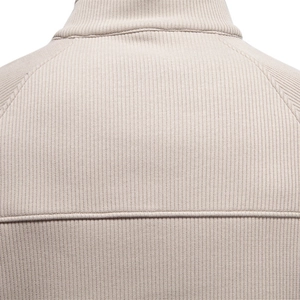 Close-up of beige men's stand-collar zip sweatshirt showing ribbed knit texture and stitching