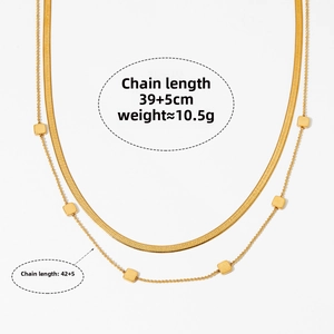 Détail du collier doré double couche avec mesures : 39+5cm, 42+5cm et poids 10,5g