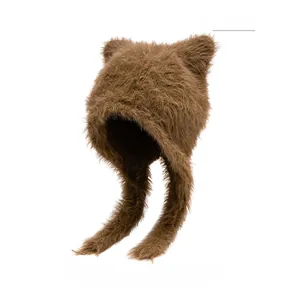 Detailed texture of coffee plush bear hat with soft long faux fur and cute round ears