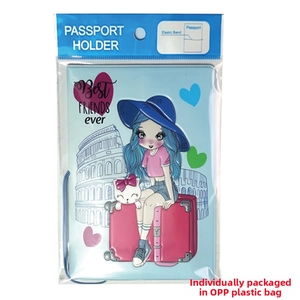 Close-up of a blue travel passport holder with girl and cat illustration in packaging