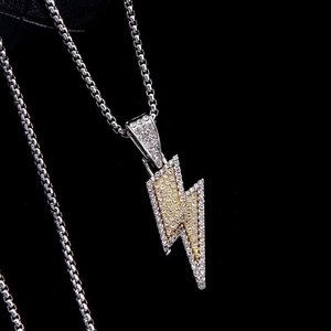 Iced out lightning bolt pendant necklace in gold and silver finish with box chain for men