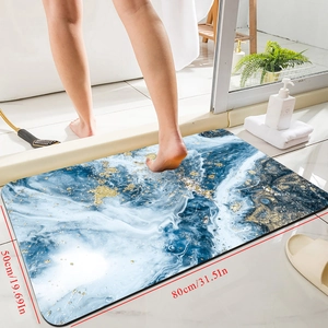 Dettaglio del tappeto in diatomite effetto marmo blu con foglia d'oro antiscivolo
