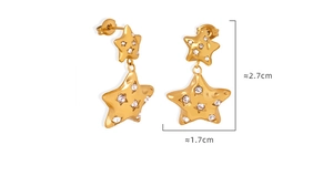 Close-up of gold star drop earrings with sparkling zircon inlay measuring 2.7cm by 1.7cm