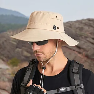 Chapeau de soleil extérieur beige pour hommes avec large bord et mentonnière réglable