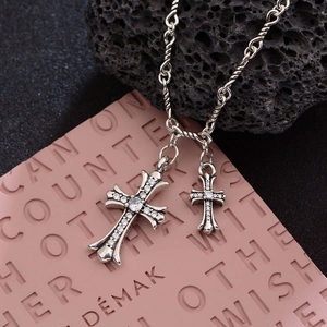 Sparkling silver cross pendant necklace with zircon stones in a retro hip-hop punk style