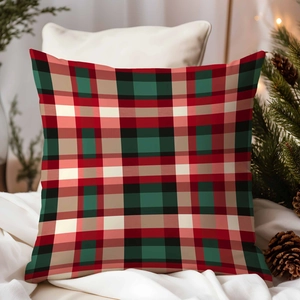 Christmas plaid throw pillow with pine cones in a cozy holiday home interior setting