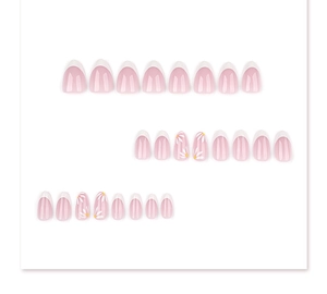 Detail of almond-shaped press-on nails with white French tips and daisy flower patterns