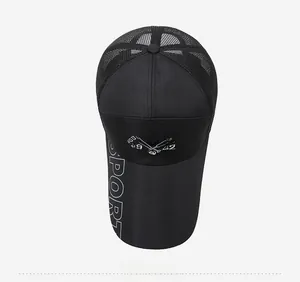 Detail of breathable mesh and embroidered sport logo on black summer baseball cap